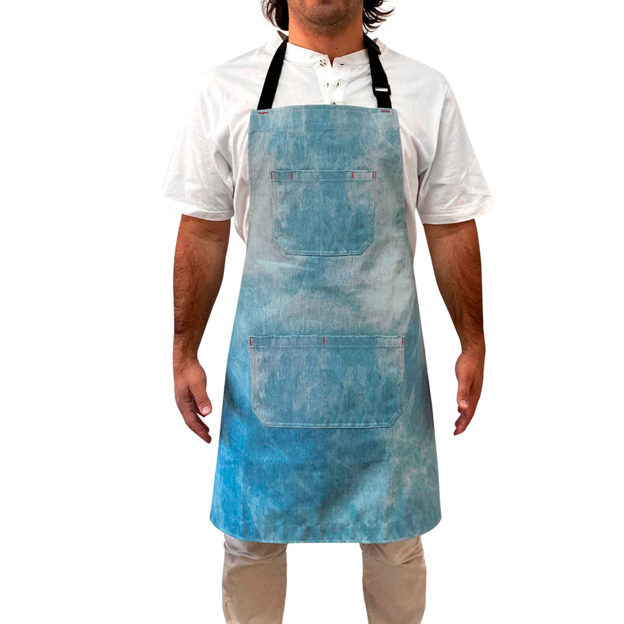 Pechera jeans tie dye Kawi, unisex. Diseño único y colorido, 100% algodón. Perfecta para cocina, parrilla y más. ¡Compra online y expresa tu estilo!